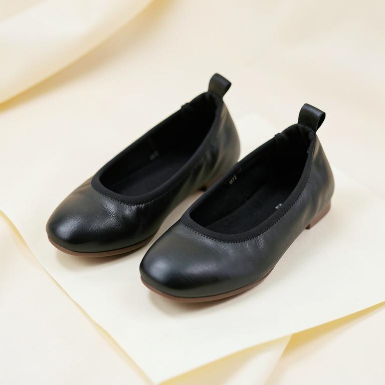 Black leather ballet flats with elastic backs