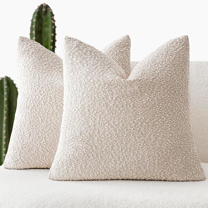 Bouclé throw pillow covers stacked